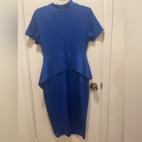 Elegant Blue Peplum Dress with Bow Detail - Picture 3 of 3